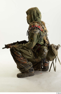 Photos John Hopkins Army Postapocalyptic Suit Poses kneeling whole body 0003.jpg